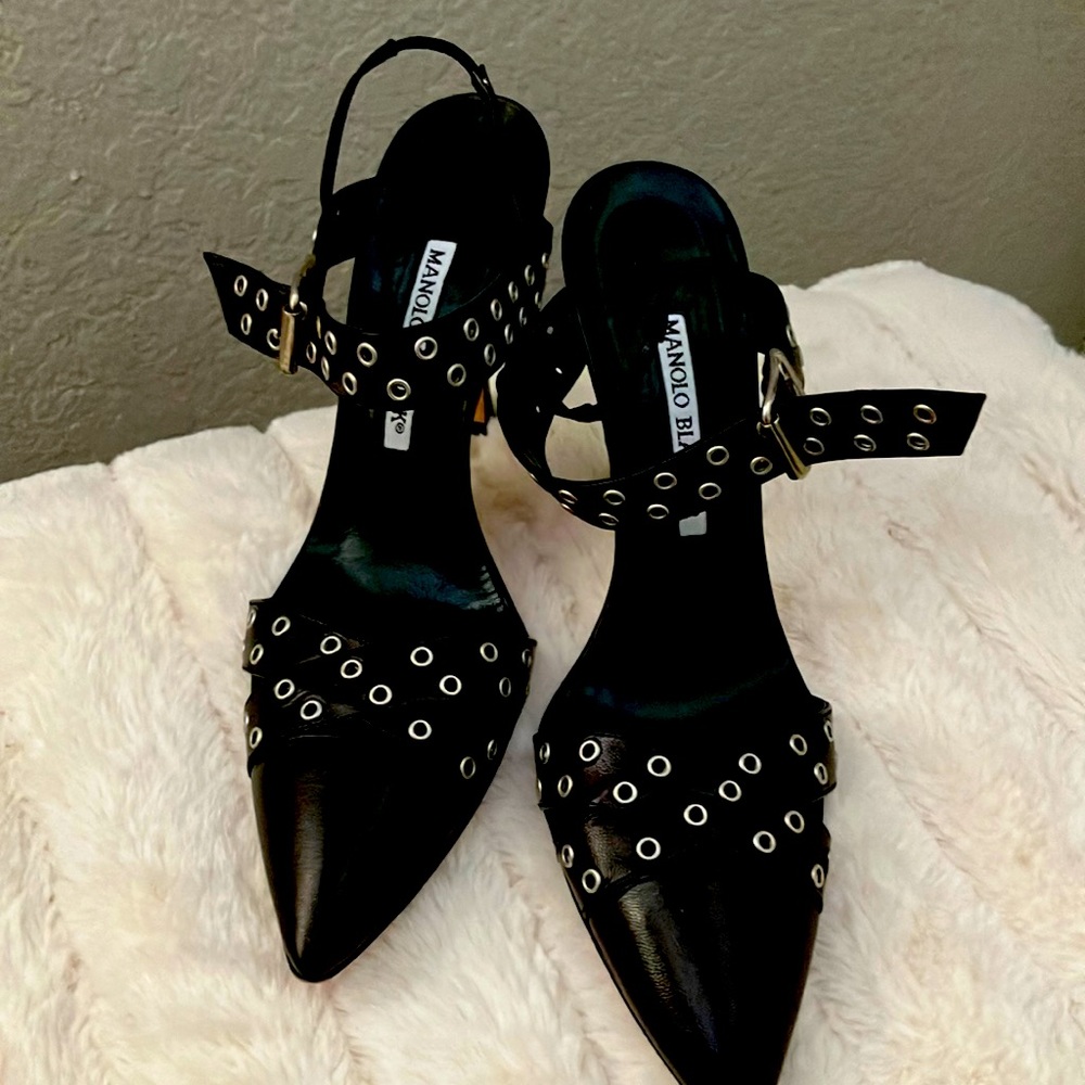 Manolo Blahnik - Black  Napa leather, nailhead trim, sling back heels.  Size 37